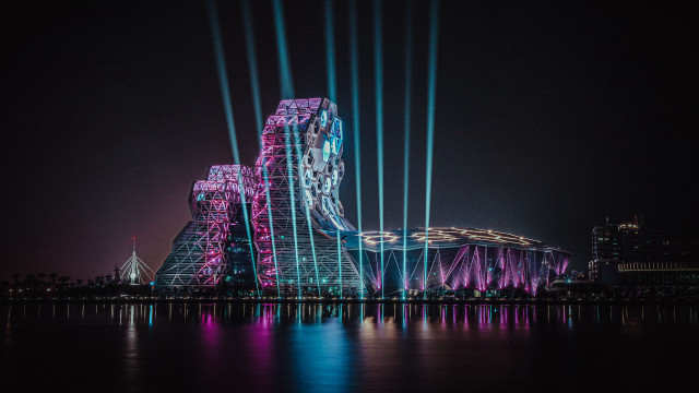 Large building city lights night free wallpaper for desktop - medium preview image