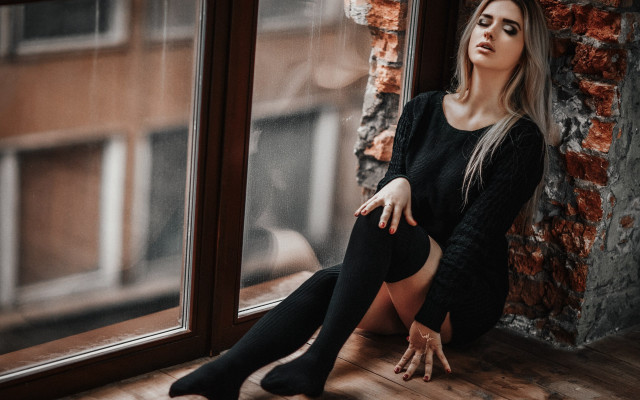 Woman sitting window still blurry free wallpaper for desktop - medium preview image