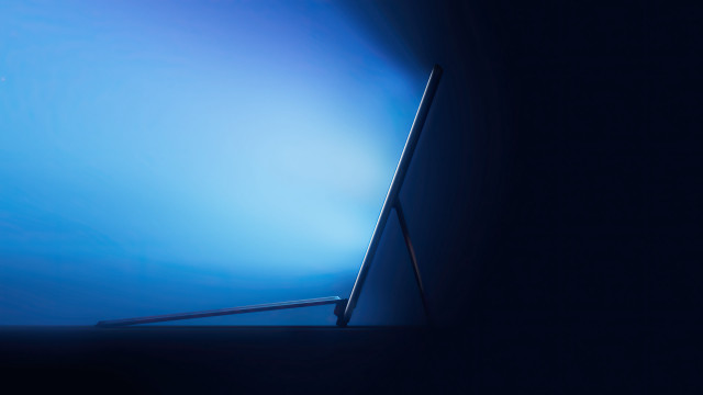 Laptop table blue sky clouds free wallpaper for desktop - medium preview image