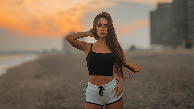 Beach woman sunset blurry longhair free wallpaper for desktop - medium preview image