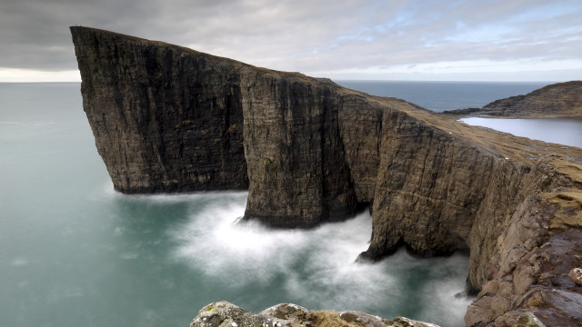 Large cliff water mountain sky free wallpaper for desktop - medium preview image