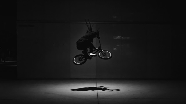 Bike trick shadow cinematic blackwhite free wallpaper for desktop - medium preview image
