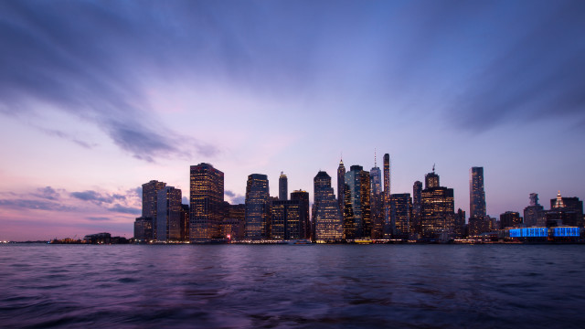 City skyline dusk water mountains free wallpaper for desktop - medium preview image