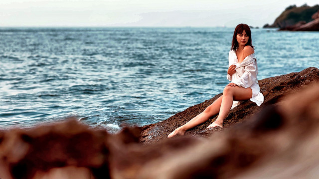 Woman ocean rock sitting barelegs free wallpaper for desktop - medium preview image