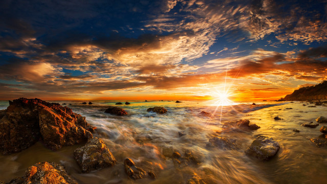 Sunset rocky beach dusk ocean free wallpaper for desktop - medium preview image