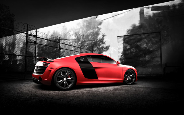 Red sports car fenced road free wallpaper for desktop - medium preview image
