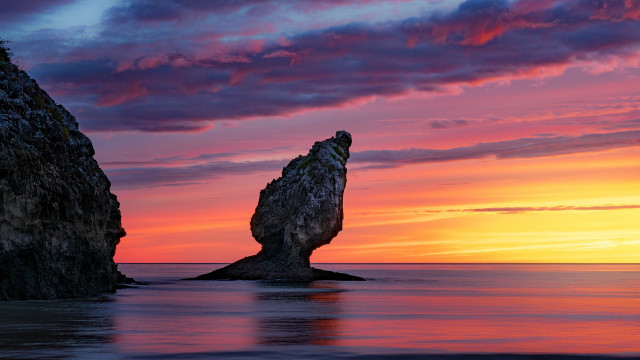 Mystical rock formation sunset water free wallpaper for desktop - medium preview image