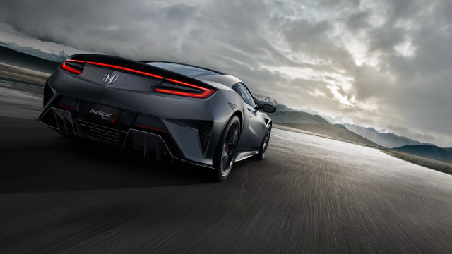 Grey sports car cloudy mountains free wallpaper for desktop - medium preview image