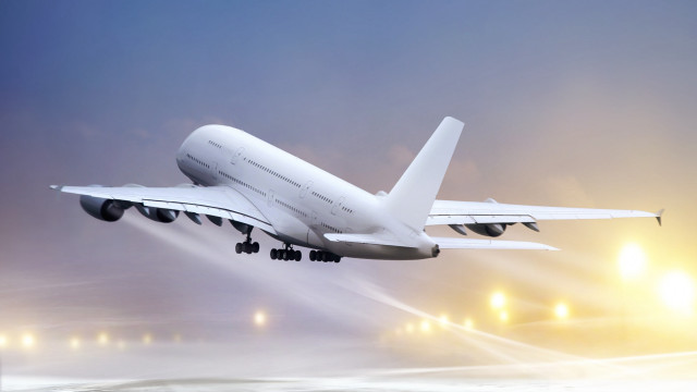 Jetliner cloudy night runway matte free wallpaper for desktop - medium preview image