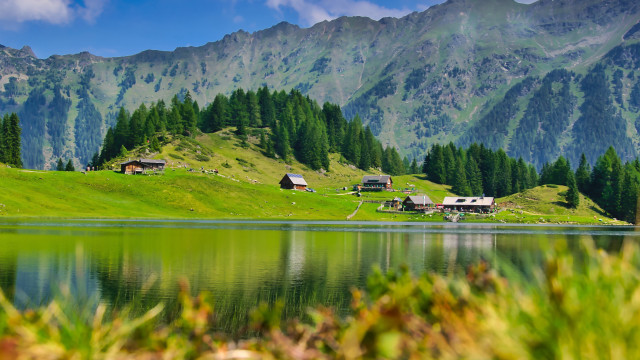 Lake mountains forest houses bicycle free wallpaper for desktop - medium preview image