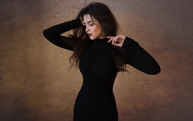 Woman black dress holding hair free wallpaper for desktop - medium preview image