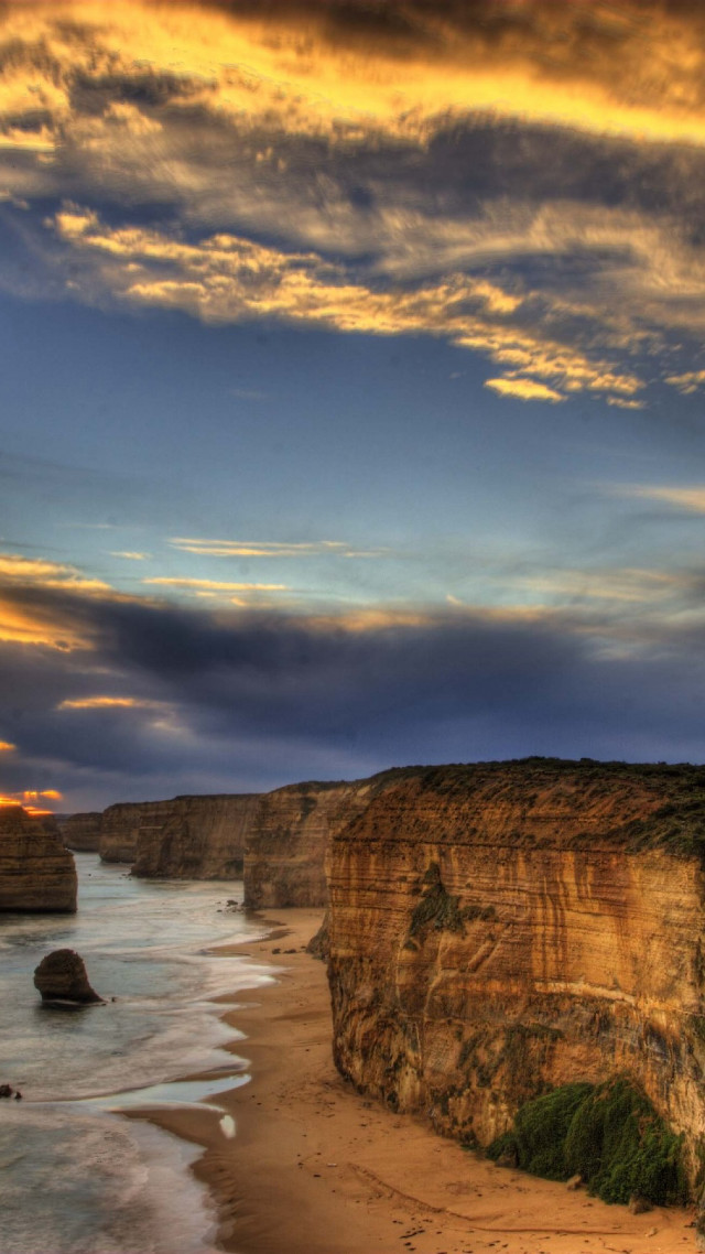 Beach cliff water cloudy sky free wallpaper for mobile - medium preview image