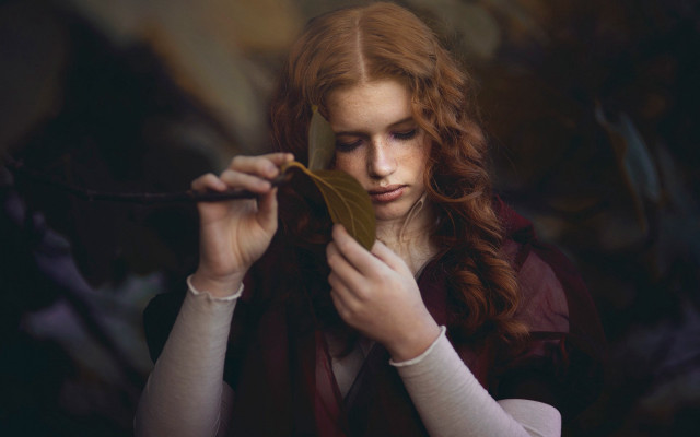 Woman leaf serious portrait blonde free wallpaper for desktop - medium preview image