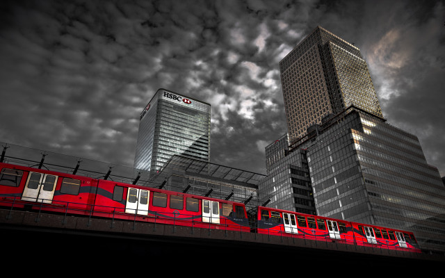 Red train tall buildings cloudy free wallpaper for desktop - medium preview image