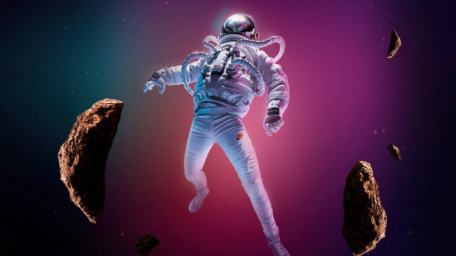 Space astronaut flying rocks purple free wallpaper for desktop - medium preview image