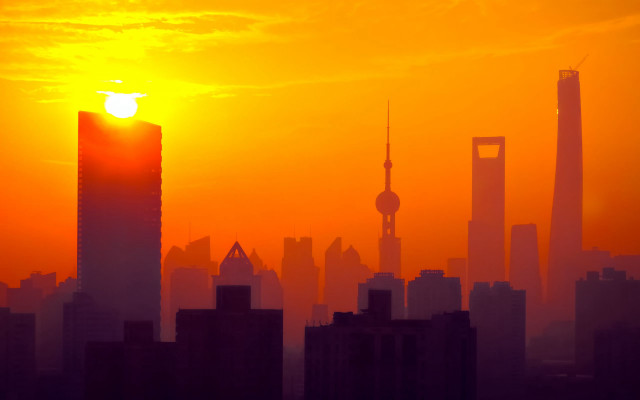 City skyline orange sky sunset free wallpaper for desktop - medium preview image