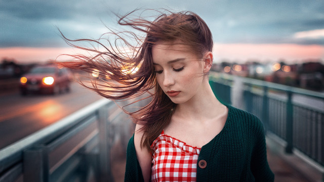 Woman blowing hair bridge dusk free wallpaper for desktop - medium preview image