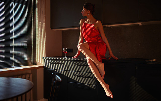 Woman red dress indoors sitting free wallpaper for desktop - medium preview image