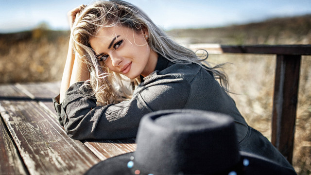 Woman longhair cowboyhat portrait outdoors free wallpaper for desktop - medium preview image