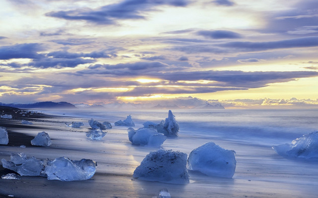 Beach ice chunks sunset clouds free wallpaper for desktop - medium preview image