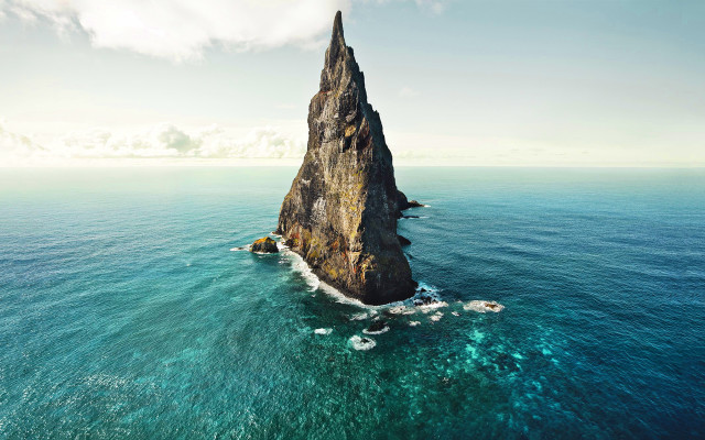 Large rock ocean beach surfboards free wallpaper for desktop - medium preview image