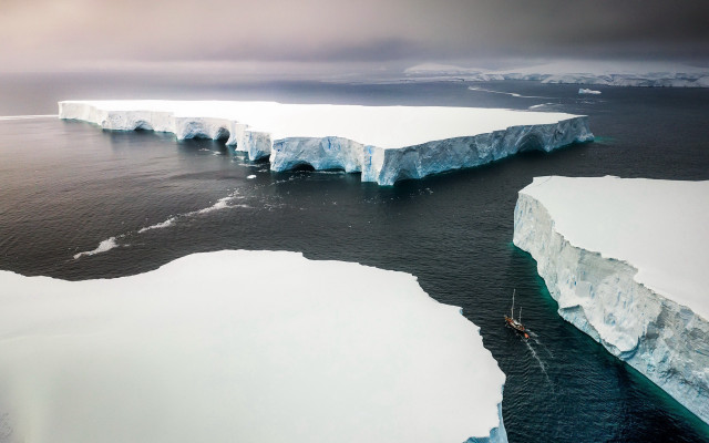 Boat icebergs ocean mountain sky free wallpaper for desktop - medium preview image