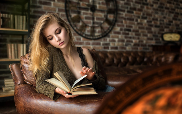 Woman sitting reading book brick free wallpaper for desktop - medium preview image
