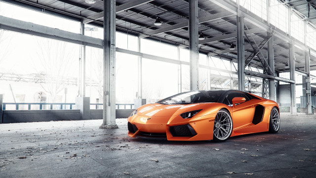 Orange sports car building windows free wallpaper for desktop - medium preview image