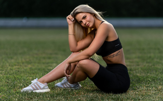 Woman sitting grass field tattoo free wallpaper for desktop - medium preview image