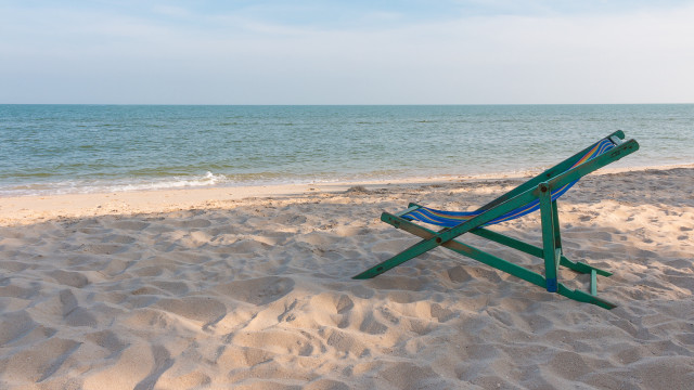 Green blue chair beach ocean free wallpaper for desktop - medium preview image
