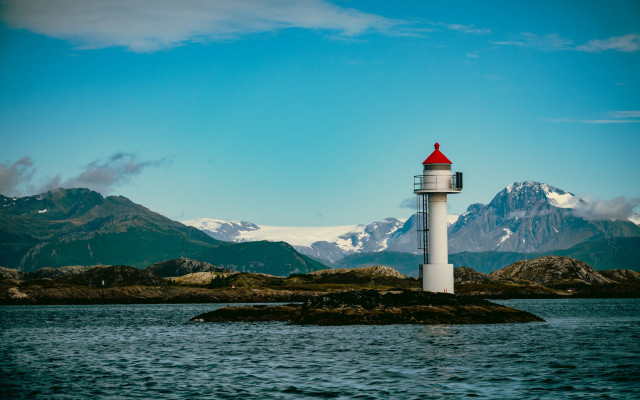 Lighthouse island lake mountains sky free wallpaper for desktop - medium preview image