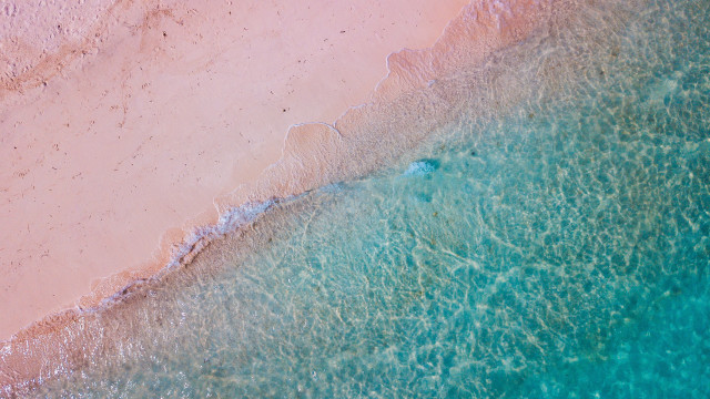 Beach boat person sandy shore free wallpaper for desktop - medium preview image