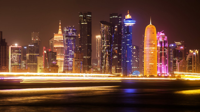 City skyline night lights boat #2 free wallpaper for desktop - medium preview image