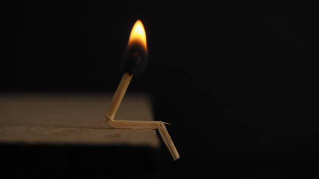 Matchstick lit dark minimalism microscopic free wallpaper for desktop - medium preview image