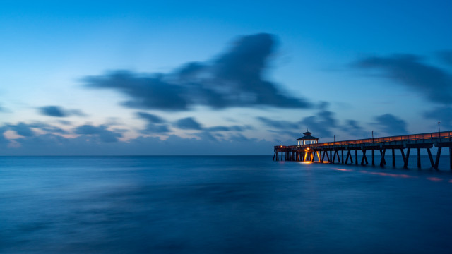 Pier lighthouse night clouds water free wallpaper for desktop - medium preview image