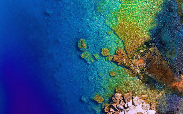 Blue green water rocks outcropping free wallpaper for desktop - medium preview image