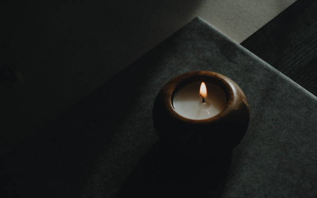 Candle lit table dark room free wallpaper for desktop - medium preview image