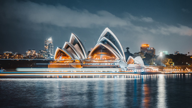 Large building city lights water free wallpaper for desktop - medium preview image