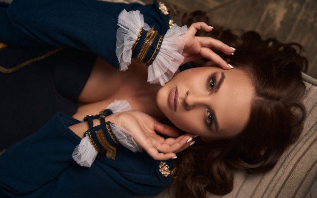 Woman blue dress couch portrait free wallpaper for desktop - medium preview image