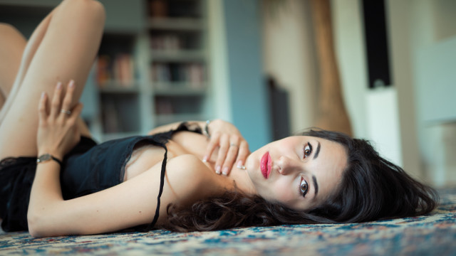 Woman lying crossed legs bokeh free wallpaper for desktop - medium preview image