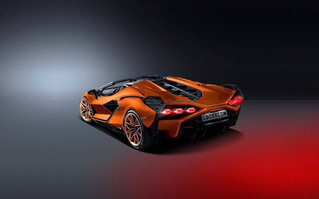 Orange sports car red light free wallpaper for desktop - medium preview image