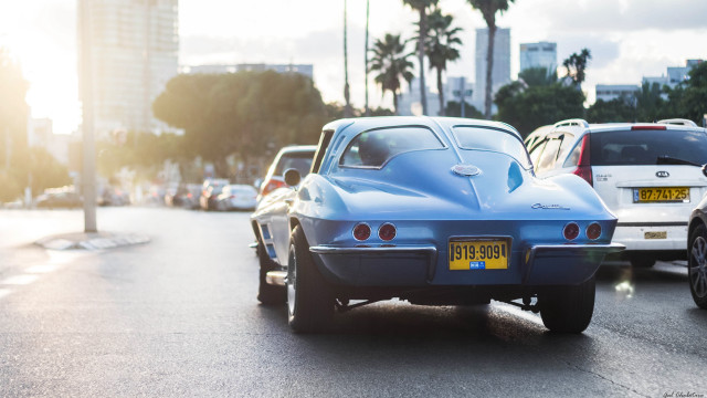 Blue car city skyline mountain free wallpaper for desktop - medium preview image