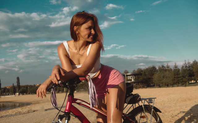 Woman bike beach sand water free wallpaper for desktop - medium preview image
