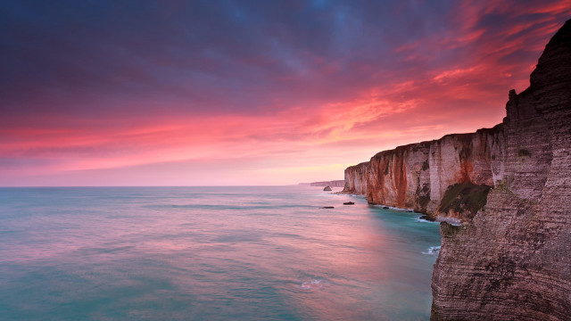 Sunset cliff water red sky free wallpaper for desktop - medium preview image