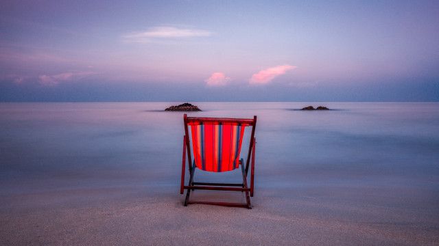 Red white chair beach sunset free wallpaper for desktop - medium preview image