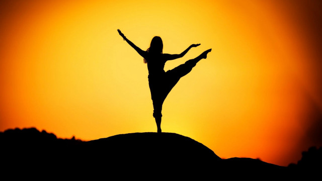 Woman outstretched arms hill sunset free wallpaper for desktop - medium preview image