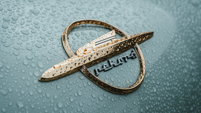Car emblem relax rain drops free wallpaper for desktop - medium preview image