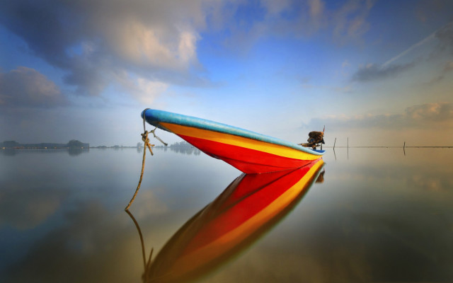 Boat reflection cloudy sky ocean free wallpaper for desktop - medium preview image
