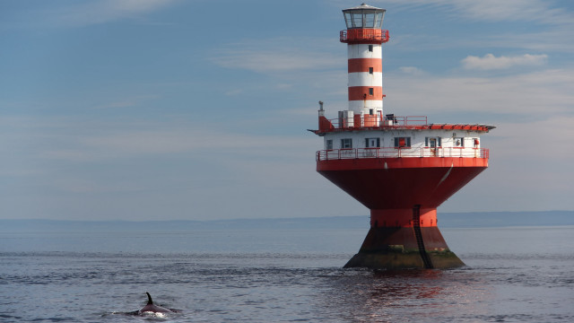 Lighthouse red white boat ocean free wallpaper for desktop - medium preview image