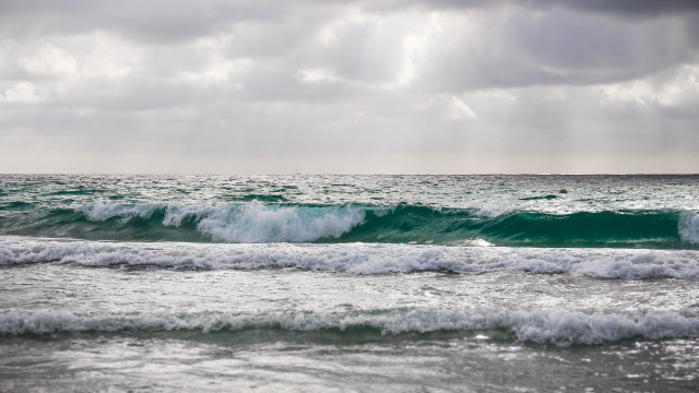 Surfboard wave ocean cloudy sky #2 free wallpaper for desktop - medium preview image